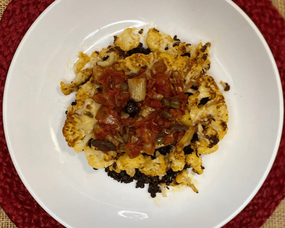 Cauliflower Steak with Mediterranean Tapenade and Black Lentils